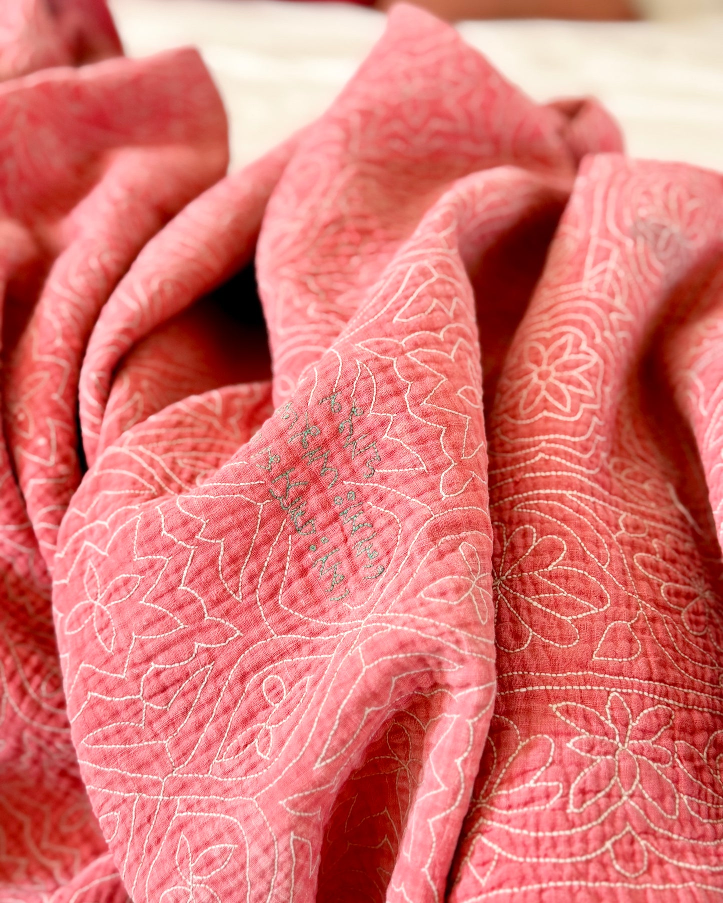 Embroidered Sujini Vintage Kantha Quilt In Faded Pink With Bengali Writing