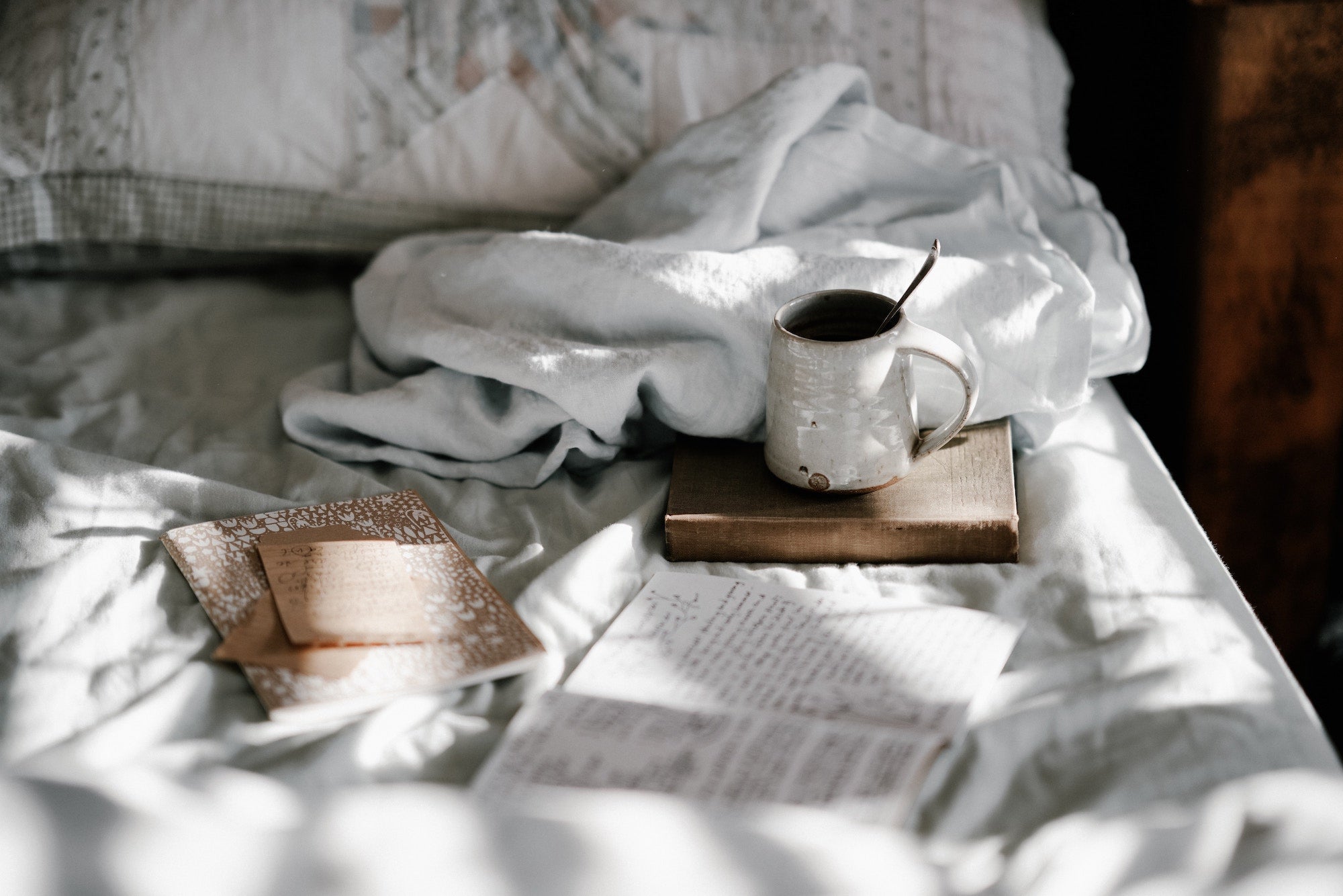 bedroom with linens and coffee in the morning
